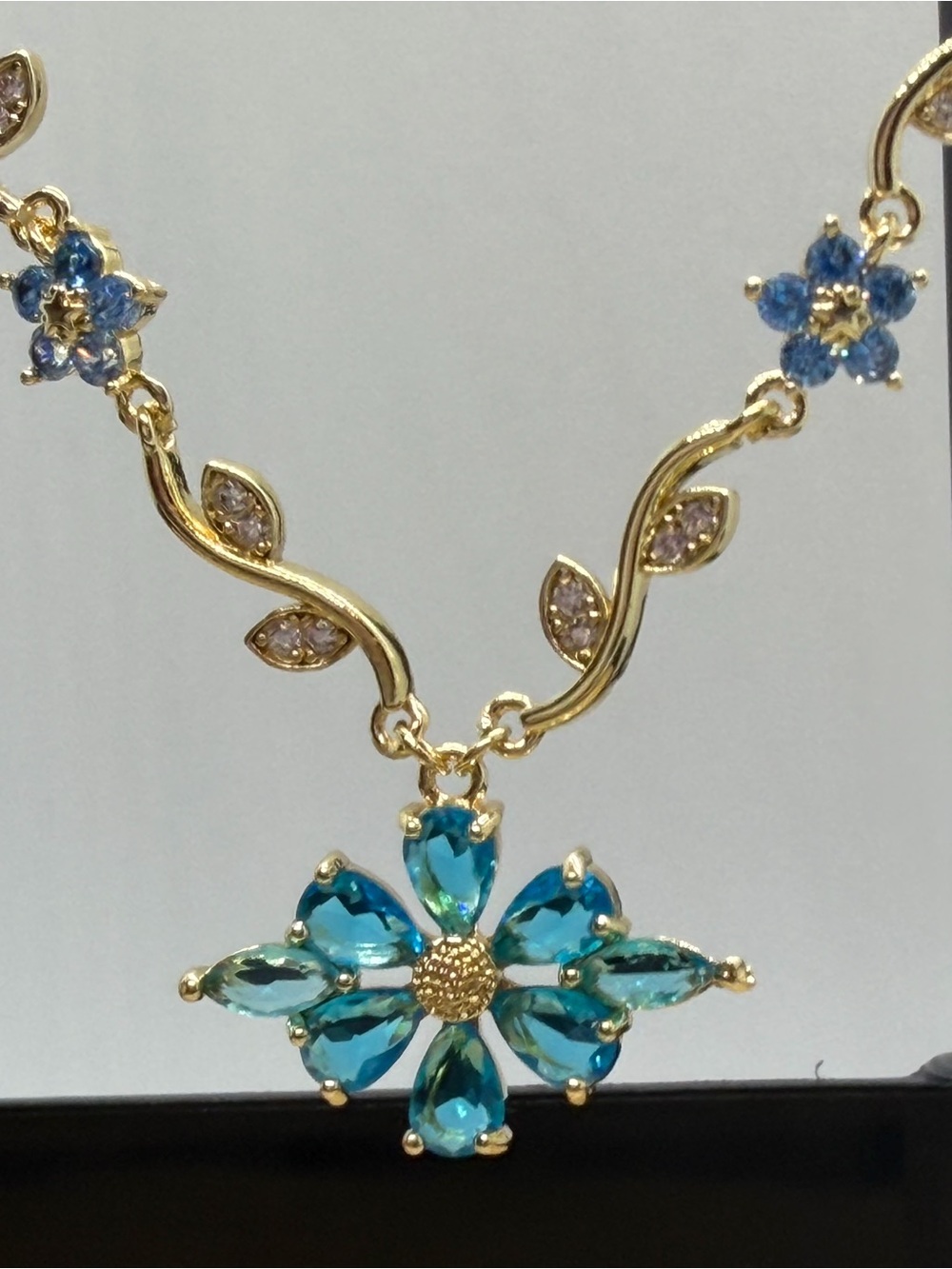 Gold-Tone Blue Floral Crystal Pendant Necklace